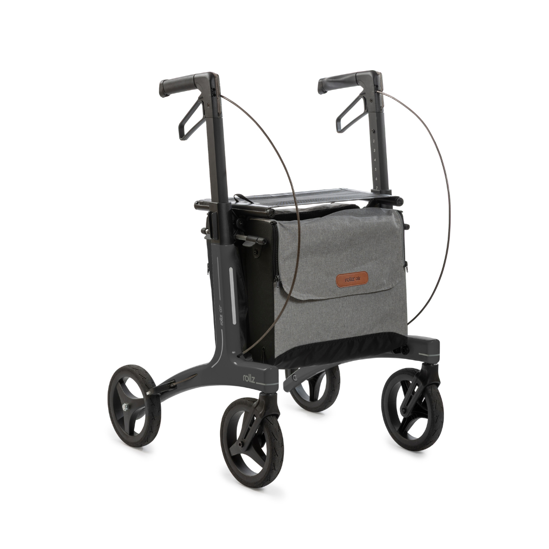 The Rollz Air Lightweight Folding Carbon Rollator weighs just 10.4 lbs and features four large wheels, ergonomic handles, a sleek black frame for stability, and a front gray storage bag—ideal for daily mobility needs.